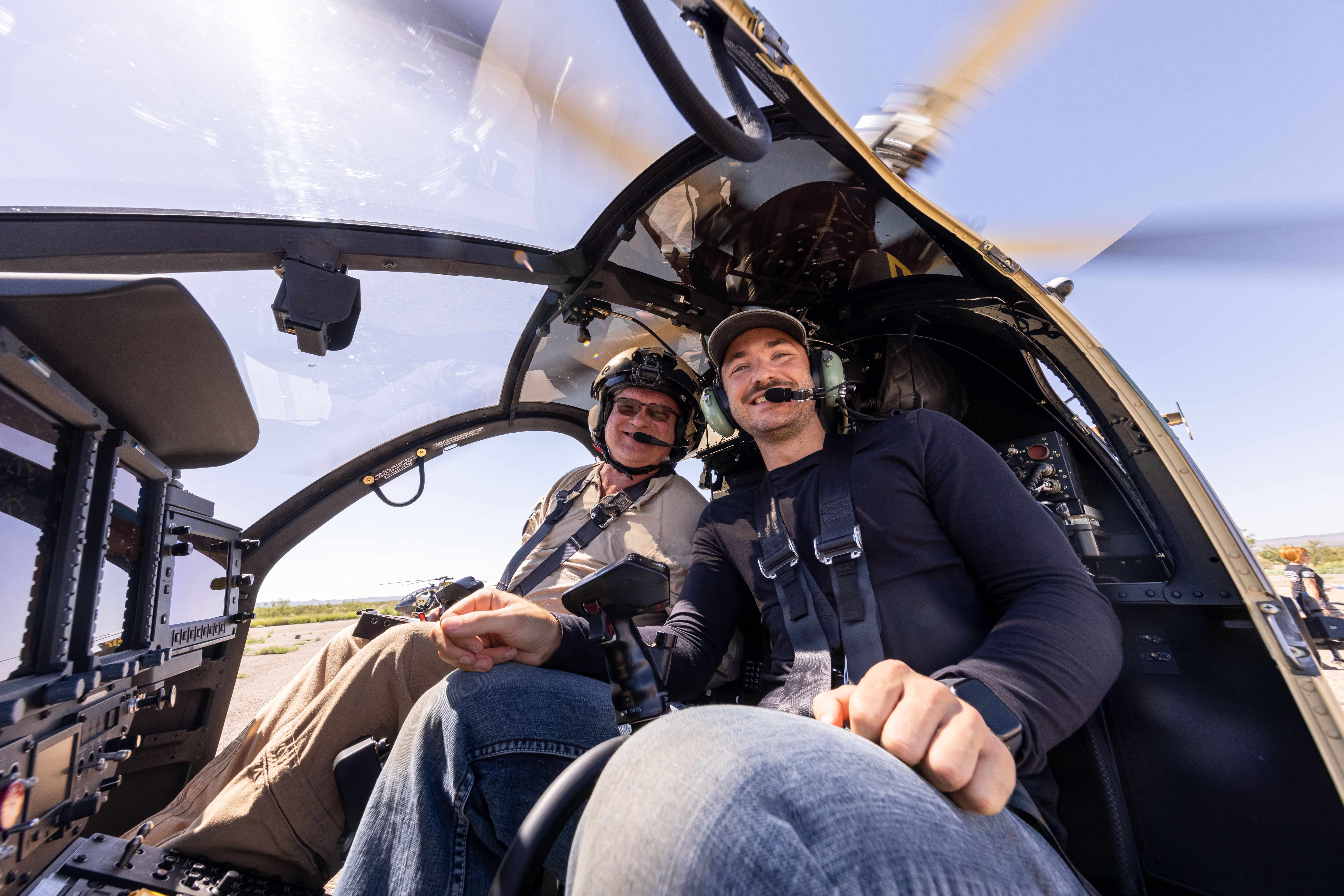 Billy Hardiman and MD Helicopters test pilot in MD 530G before aerial photoshoot
